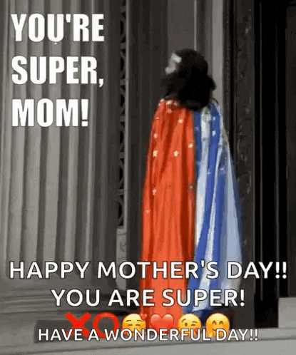 a woman in a superhero costume is standing in front of a building on mother 's day .