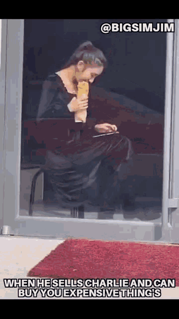 a picture of a woman eating a sandwich with the caption when he sells charlie and can buy you expensive things ..