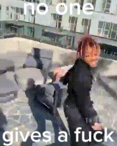 a man is dancing on a roof with the words no one gives a fuck above him