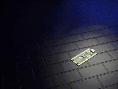 a piece of electronic equipment is laying on a brick floor