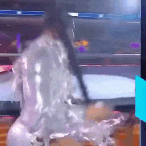 a statue of a horse is being poured into a pool of water