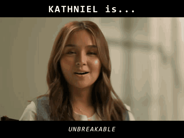 kathniel is unbreakable is written above a woman