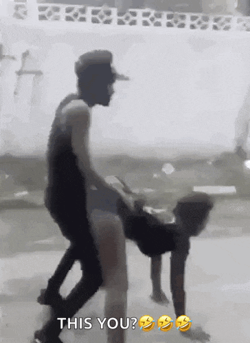 a man is standing on a woman 's back and says this you ?