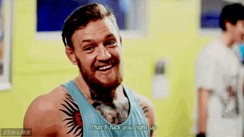 a man with a tattoo on his chest is smiling and saying that 'll fuck you right up