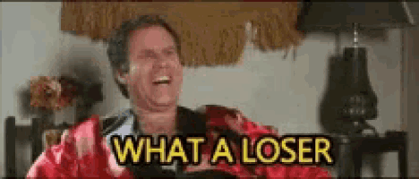 a man is laughing and saying `` what a loser '' .
