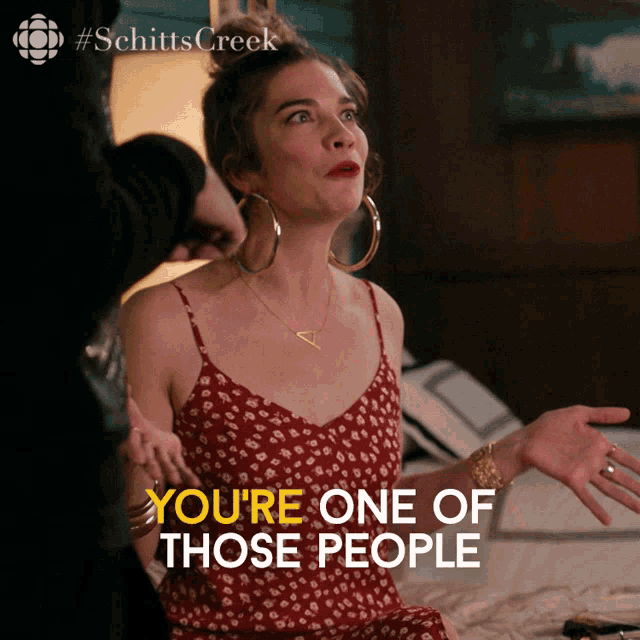 a woman in a red dress with the words " you 're one of those people " above her