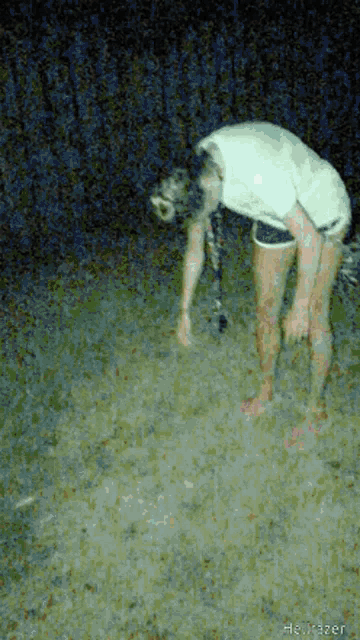 a blurred image of a person with the words hellrazer at the bottom of the image