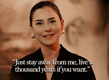 a woman is smiling with a quote that says just stay away from me live a thousand years if you want
