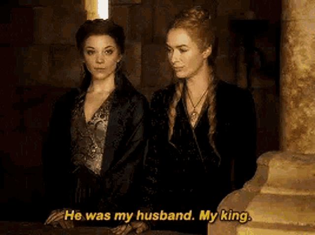 two women are standing next to each other and one of them is saying `` he was my husband , my king '' .