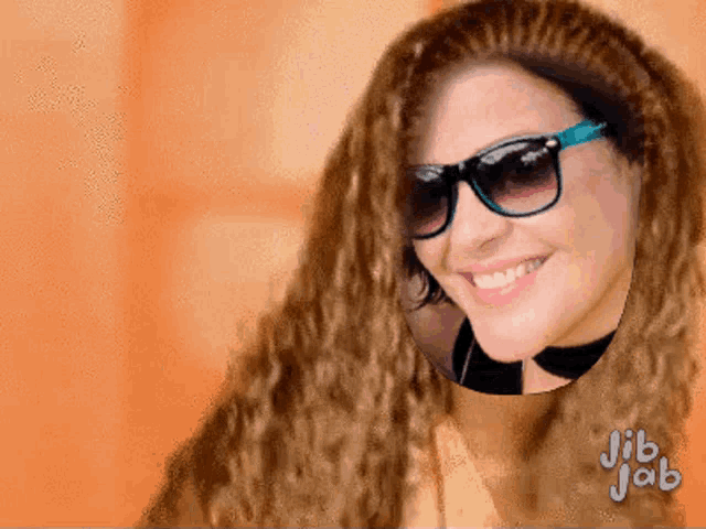a woman wearing sunglasses and a choker with jib jab written on the bottom right