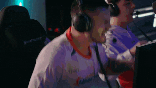 a man wearing headphones and a shirt that says blacklite on it