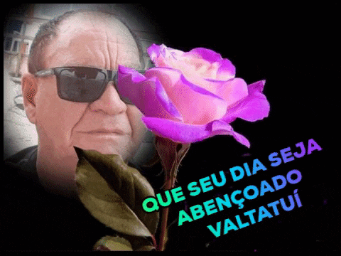 a man wearing sunglasses is holding a purple rose with the words que seu dia seja abencoado valtatui on the bottom