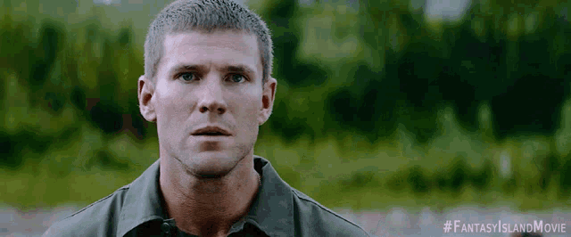 a close up of a man 's face with a #fantasyislandmovie watermark