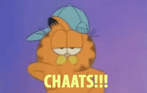 garfield is wearing a blue hat and says chaats