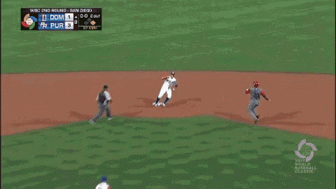 a baseball player wearing a puerto rican jersey is walking on the field