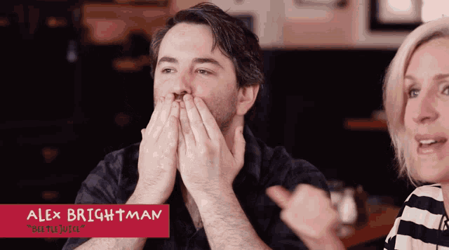 a man covering his mouth with his hands next to a woman with the name alex brightman on the bottom