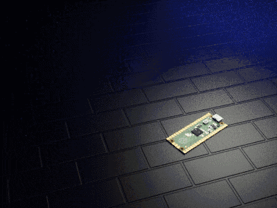 a piece of electronic equipment is laying on a black tile floor