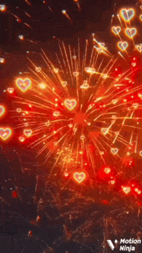 a fireworks display with hearts coming out of it and the words motion ninja on the bottom