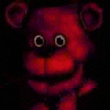 a purple teddy bear with big eyes is standing in the dark and looking at the camera .