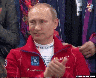 a man in a red jacket with the word bionic on his shirt