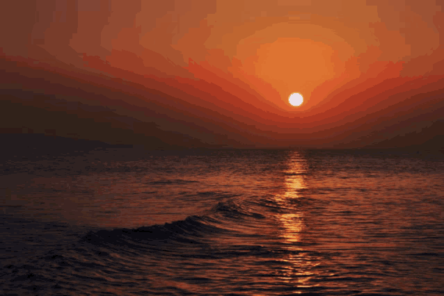 the sun is setting over the ocean with waves