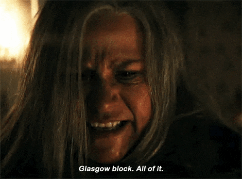 a woman is saying glasgow block all of it .