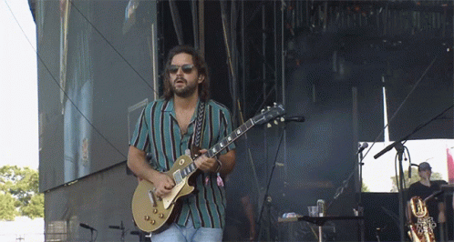 Rocking Out Guitarist GIF - Rocking Out Guitarist Jamming Out GIFs