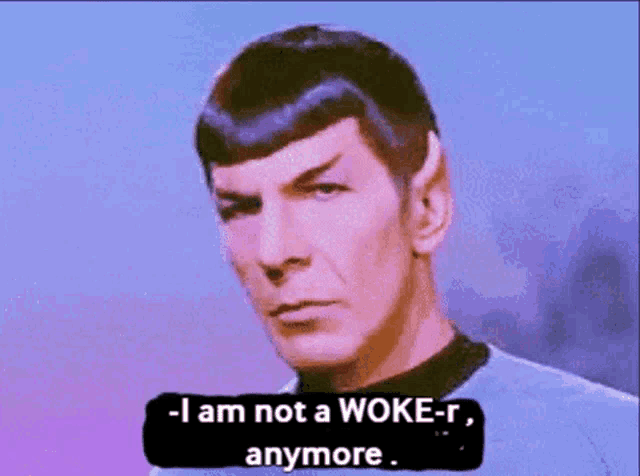 a man with purple hair says - i am not a woke-r anymore ..