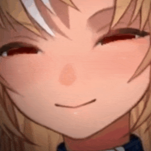 a close up of a girl 's face with her eyes closed and a smile on her face .