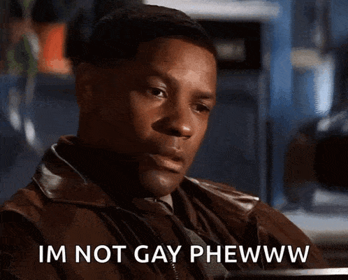 a man in a brown jacket and tie says im not gay phewww
