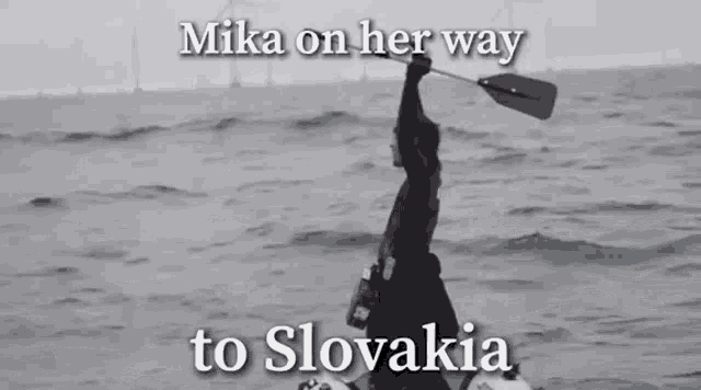 a man in a boat with the words mika on her way to slovakia below him