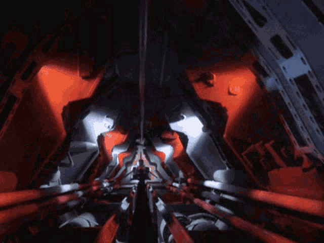a dark room with a red light on the bottom