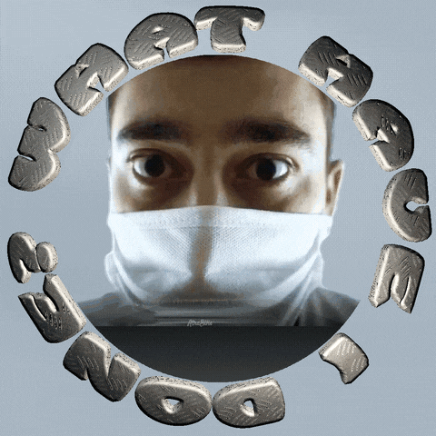 a picture of a man wearing a face mask with the words " act boom " around his face
