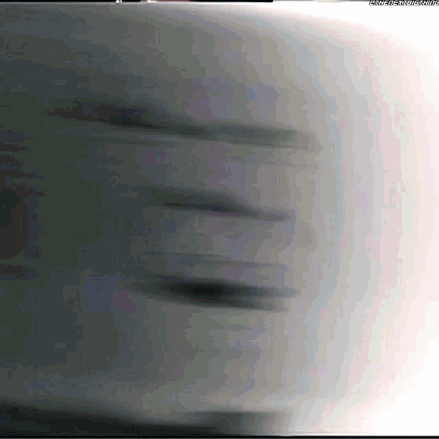 a blurred image of a person 's face with a watermark that says ' wrestlingmania ' at the bottom