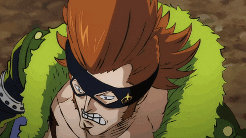 a cartoon character with red hair and a black mask on his face