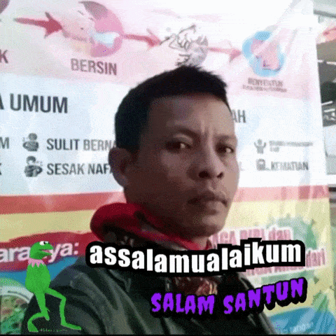 a man is standing in front of a sign that says " assalamualaikum "