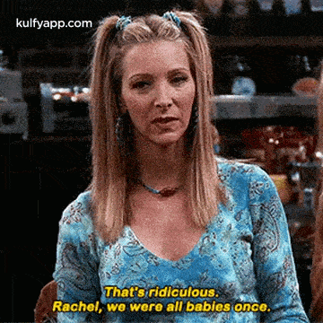 a woman in a blue shirt is saying `` that 's ridiculous . rachel , we were all babies once . ``