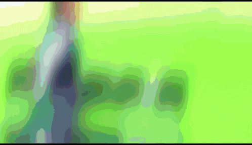 a green background with a few spots of blue and green