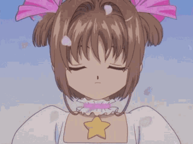 a cartoon girl with wings and a star on her chest
