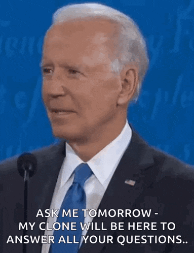 a man in a suit and tie is talking into a microphone and says ask me tomorrow