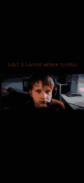 a boy wearing headphones looks at the camera with the words " kdyz ti kamos sezere tycinku " above him