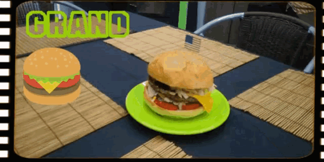 a green plate with a hamburger on it and the word grand on the top