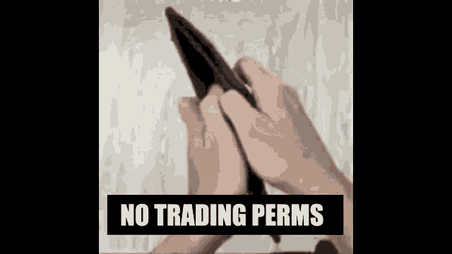 a person is holding an empty wallet in their hands with the words `` no trading permits '' above them .