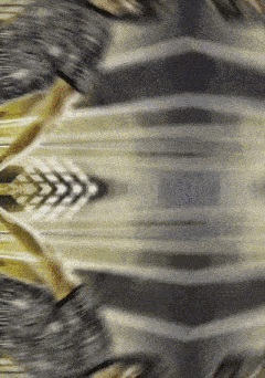 a blurred image of a person 's face with a few arrows pointing in opposite directions