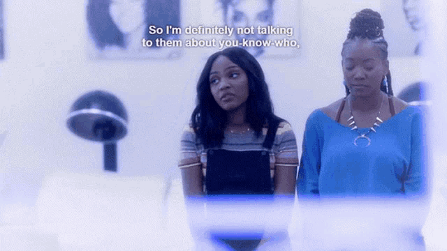 two women standing next to each other with the words so i 'm definitely not talking to them about you