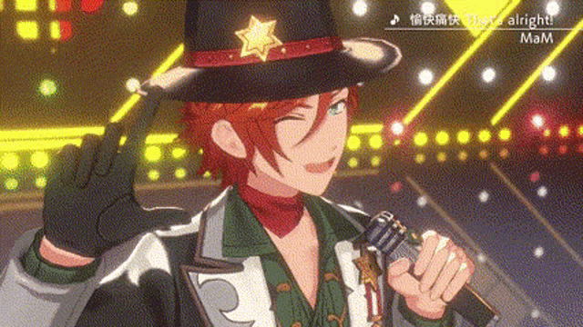 a man in a cowboy hat is singing into a microphone