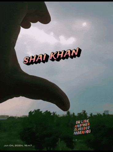 a hand is making a heart shape with the name shai khan in the sky