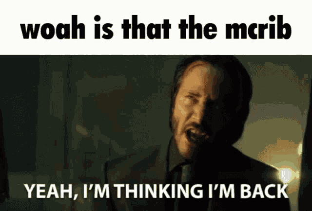 a man in a suit and tie says woah is that the mcrib