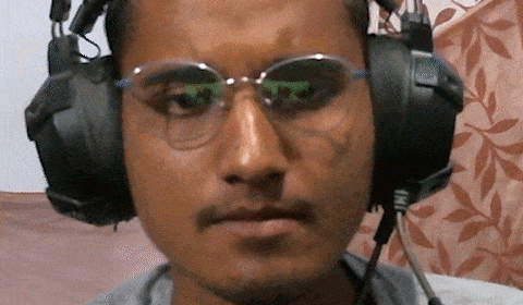 a man wearing a pair of headphones and glasses