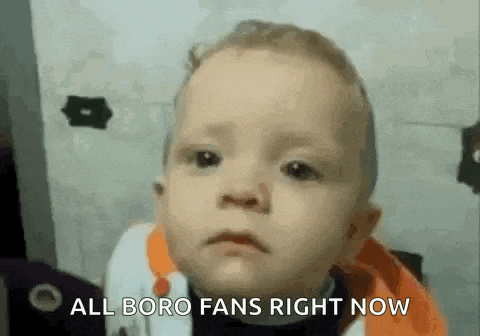 a baby is making a sad face and saying `` all boro fans right now ''